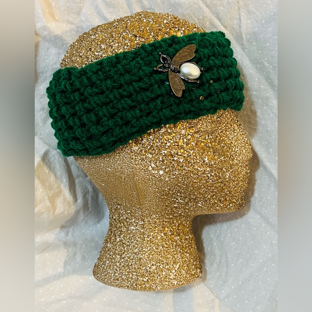 Green hand crocheted headband ear warmer with decorative faux pearl bee button